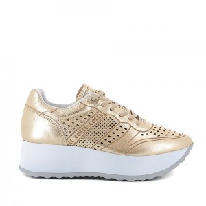 zapatillas con plataforma cetti doradas